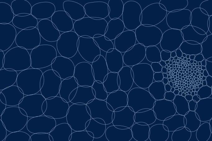 A graphic pattern composed of circles tightly arranged together, echoing the behavior of cells.