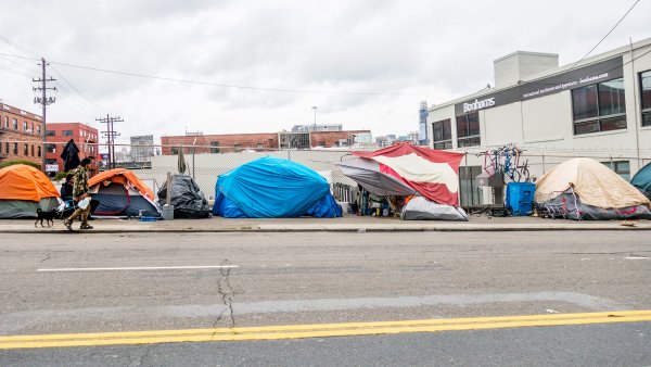 tents line a sidewalk