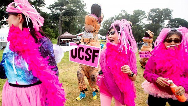 people dressed in pink outfits