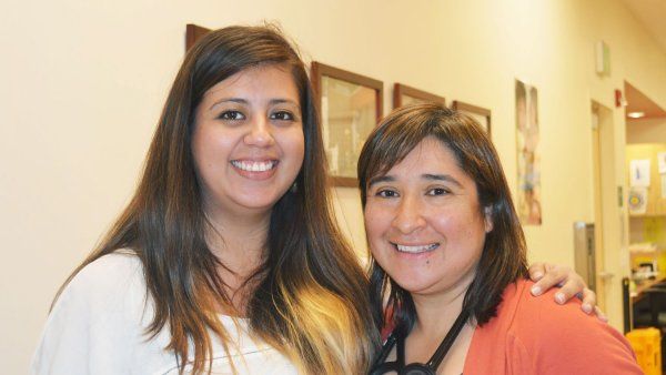 Two women smiling