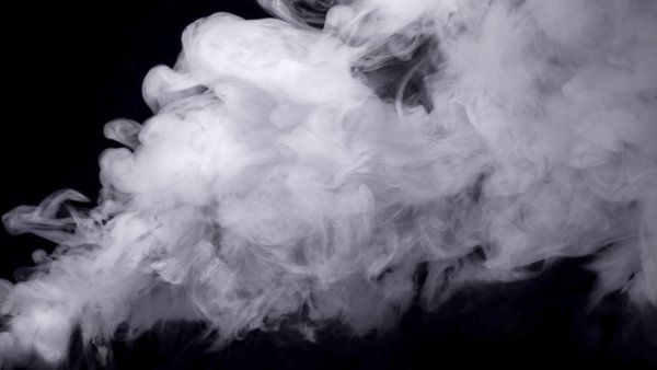 Vape smoke on black background