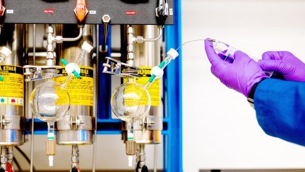 Ian Seiple works in his pharmacy lab