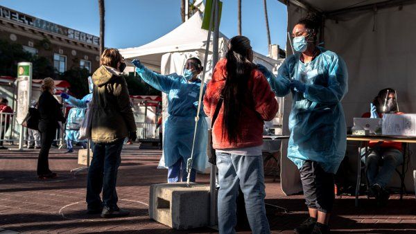 People getting COVID tests outdoors