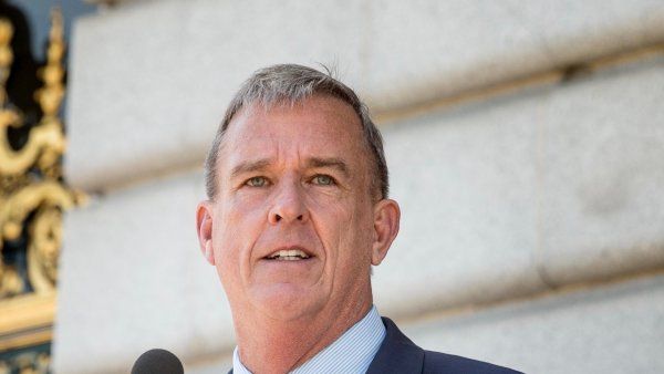 Portrait of Jeff Sheehy speaking at a podium