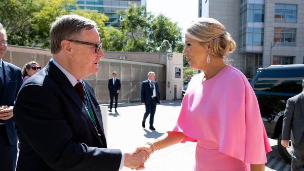 Chancellor Hawgood (left) greets Dutch Queen Maxima (right)