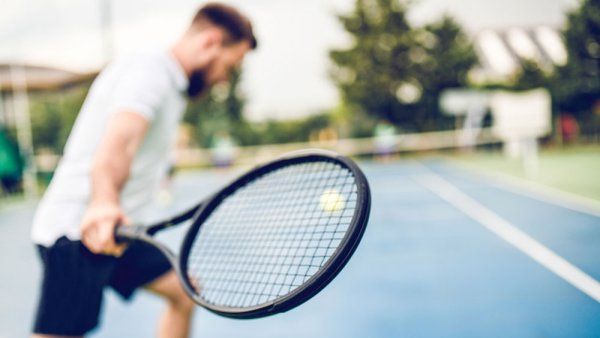 A man playing tennis