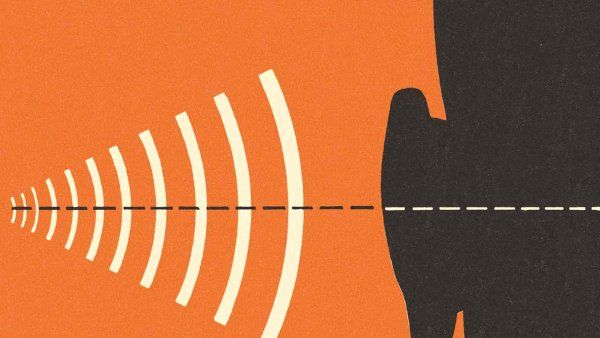 A partial sillhouete of a person's face, showing sound frequency waves entering the ear.