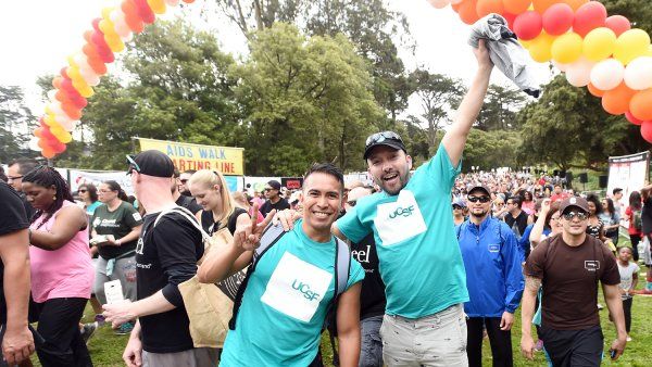 Participants are excited at the start line of AIDS Walk in Sharon Meadow.