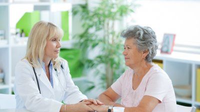 doctor-comforting-elderly-patient.jpg