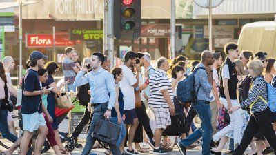 man-on-phone-on-busy-street.jpg