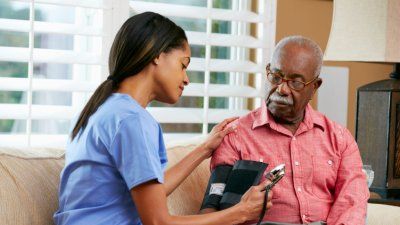 nurse-blood-pressure-hypertension-elderly-black-man.jpg