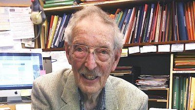 Bruce Ames holds a tray of CHORI bars