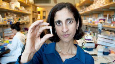 Tejal Desai holding a pill